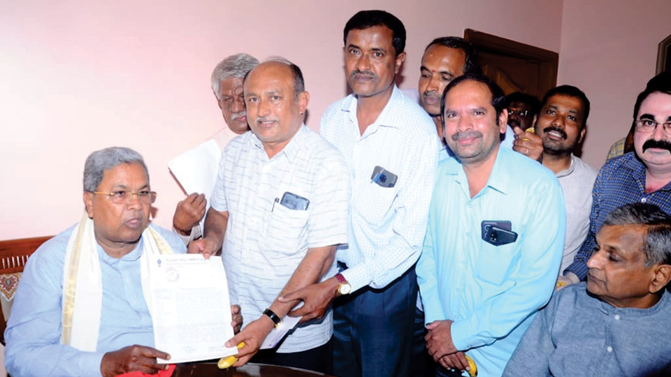 CM assures CA site allotment letter from MUDA to MDJA